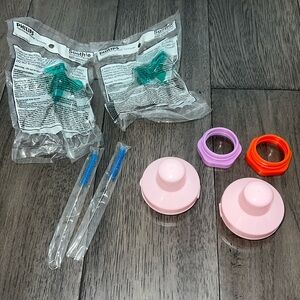 NWT Bundle of baby pacifiers and storage containers, baby bottle scrubbers